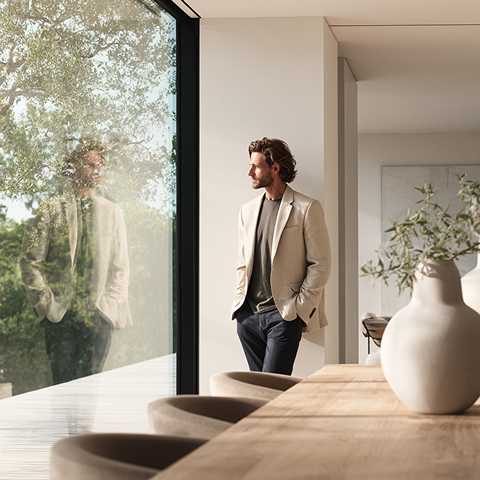 Man in blazer walking